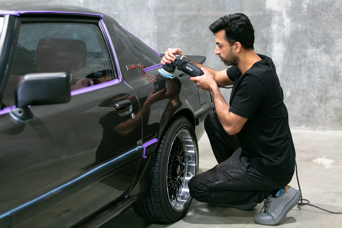 Vehicle paintwork being prepared and decontaminated